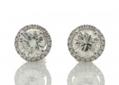 18ct White Gold Single Stone Earrings With Halo Setting 0.65 Carats