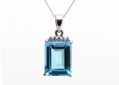 9ct White Gold Diamond And Emerald Cut Blue Topaz Pendant