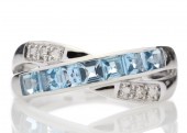9ct White Gold Diamond and Blue Topaz Half Eternity Ring