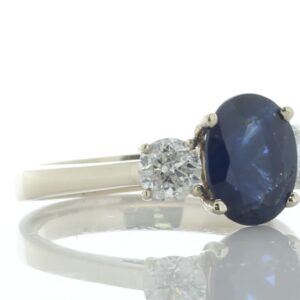 18ct Yellow Gold Three Stone Oval Cut Diamond And Sapphire Ring (S2.16) 0.77