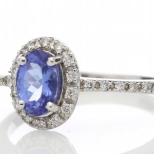 18ct White Gold Diamond And Tanzanite Halo Setting Ring 0.15 Carats