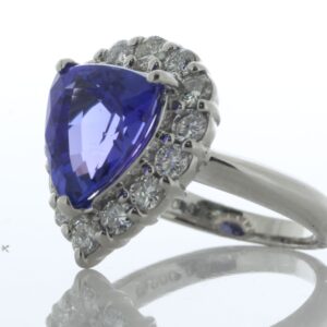 Platinum Trillion Cut Tanzanite And Diamond Ring (T3.72) 0.85