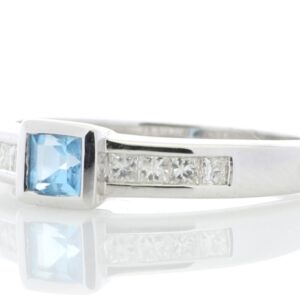 9ct White Gold Channel Set Diamond and Princess Cut Blue Topaz Ring 0.20 Carats