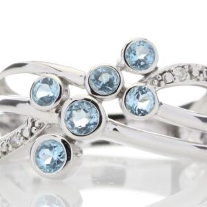 9ct White Gold Fancy Cluster Diamond And Blue Topaz Ring 0.06 Carats