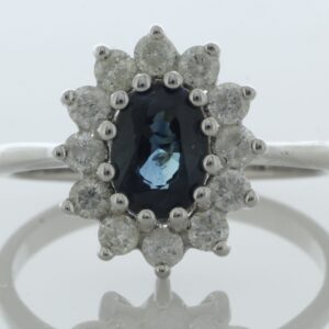 9ct White Gold Three Stone Oval Sapphire And Diamond Ring (S0.94) 0.40