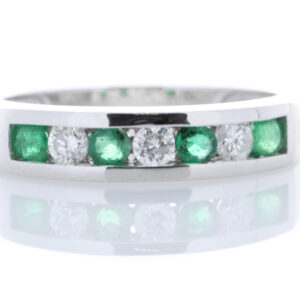 9ct White Gold Channel Set Semi Eternity Diamond And Emerald Ring (E0.30) 0.25