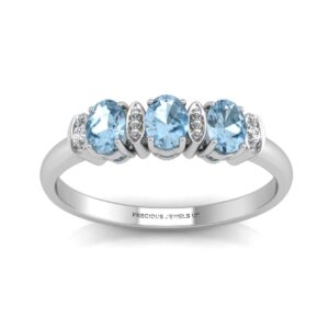 9ct White Gold Semi Eternity Diamond And Blue Topaz Ring 0.01 Carats