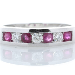 9ct White Gold Channel Set Semi Eternity Diamond And Ruby Ring (R0.30) 0.25