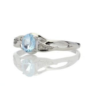 9ct White Gold Fancy Cluster Diamond And Blue Topaz Ring 0.01 Carats