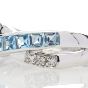 9ct White Gold Blue Topaz And Diamond Ring 0.06 Carats