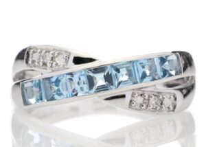 9ct White Gold Blue Topaz And Diamond Ring 0.06 Carats