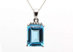 9ct White Gold Diamond And Blue Topaz Pendant (T3.76) 0.01