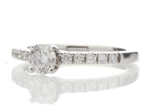 18ct Single Stone Claw Set With Stone Set Shoulders Diamond Ring 0.56 Carats