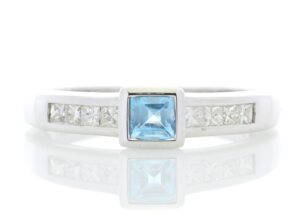 9ct White Gold Channel Set Diamond and Princess Cut Blue Topaz Ring 0.20 Carats