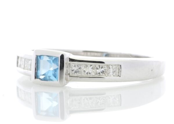 9ct White Gold Channel Set Diamond and Princess Cut Blue Topaz Ring 0.20 Carats - Image 2