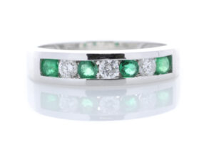 9ct White Gold Channel Set Semi Eternity Diamond And Emerald Ring (E0.30) 0.25